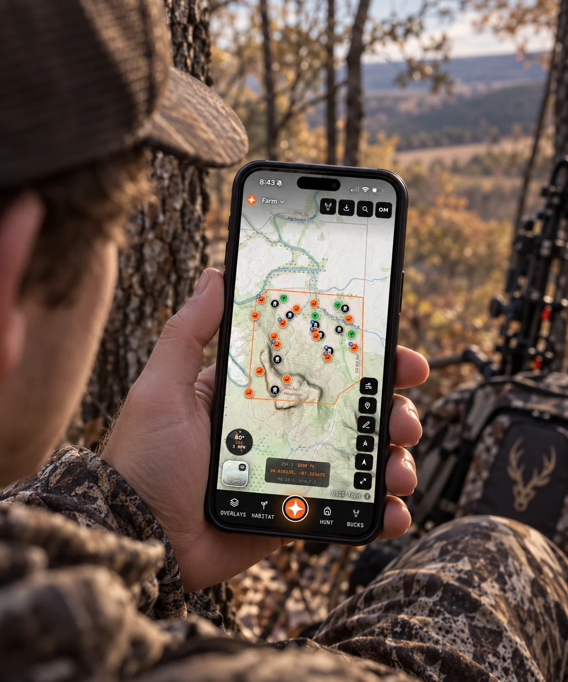 Reading a topo map of a hunting property on a phone from a treestand
